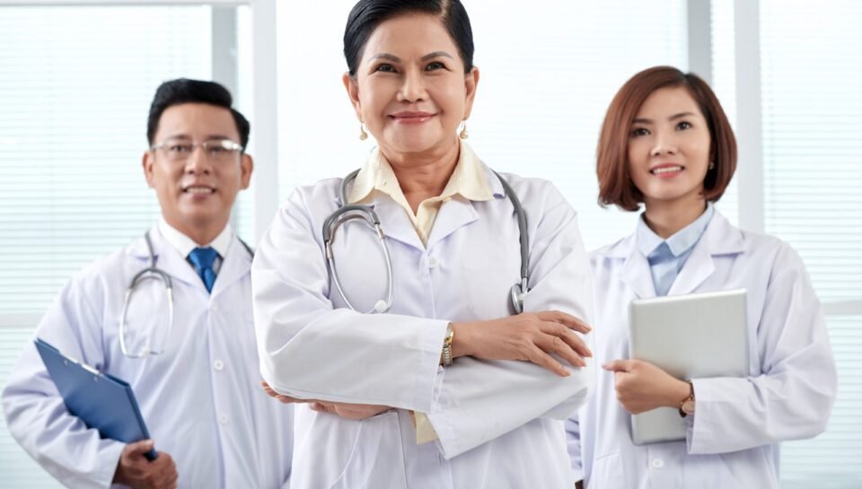 Vietnamese team of smiling medical workers